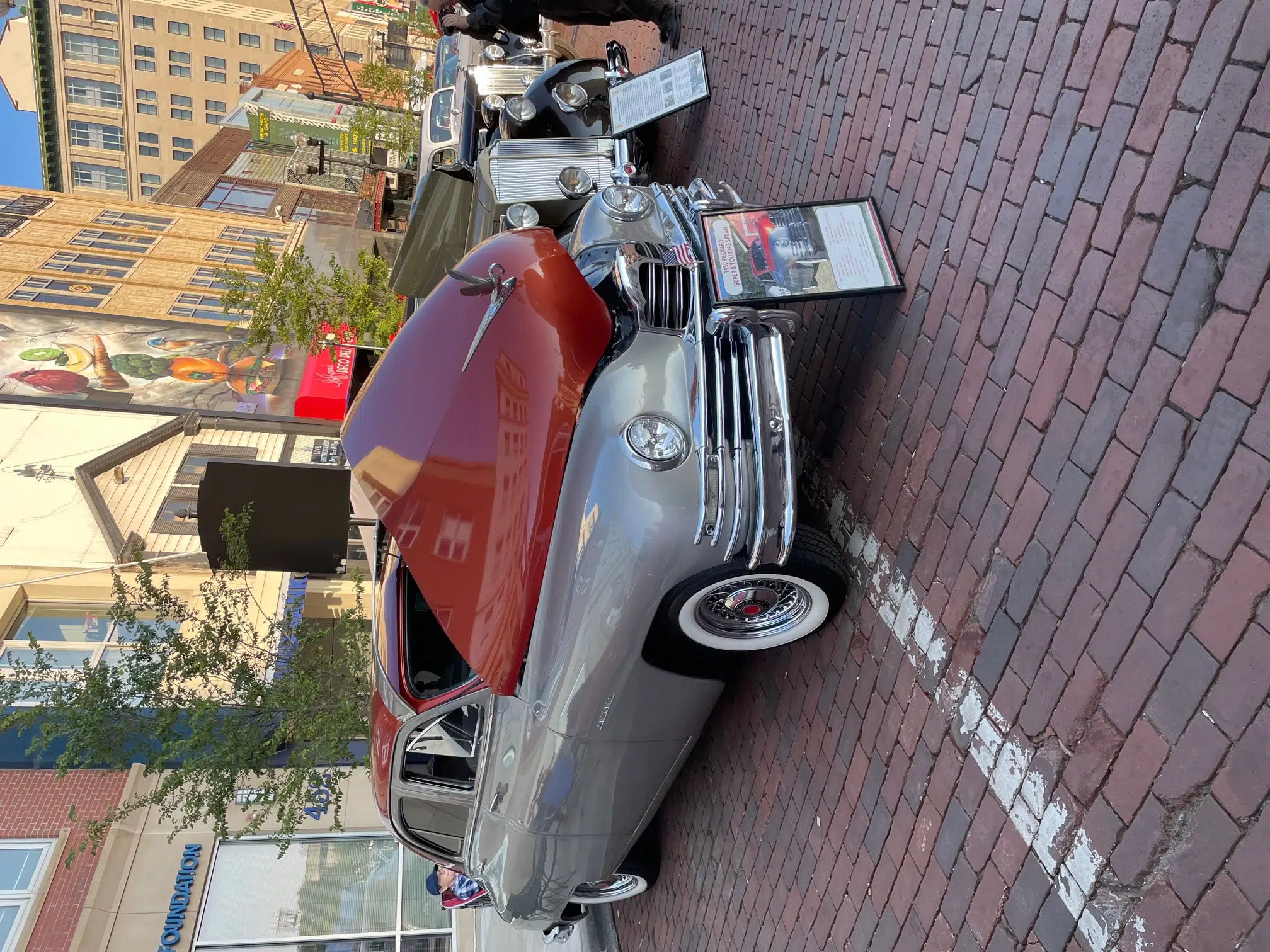 1948 Packard Super Eight 4-Door Touring Sedan in non-factory red & silver, Front 3/4 View