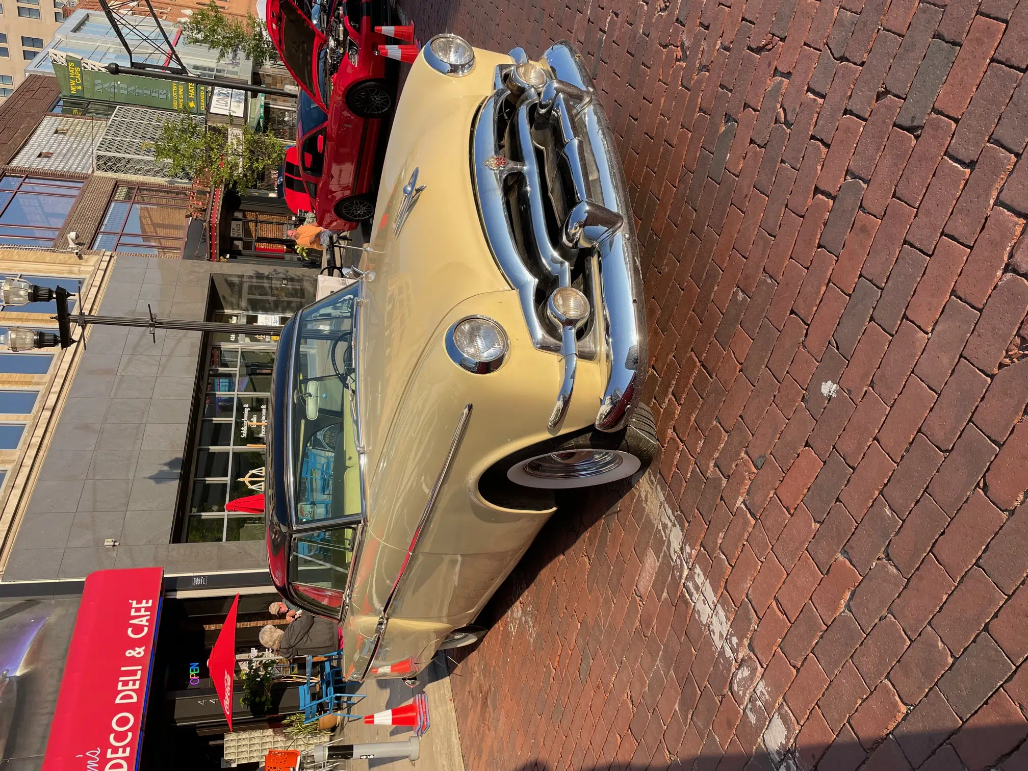 1954 Packard Clipper Panama 2-Door Hardtop in Yellow & Black, Front 3/4 View